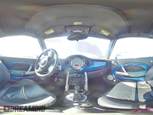 2005 MINI Convertible S z VIN WMWRH33565TK56154, wystawiony jako Copart lot #55860025 z przebiegiem 59 672 mil mil oraz Szkoda całkowita • Salvage title. Historia ofert i sprzedaży dostępna na DreamBid. Obrazek 14.