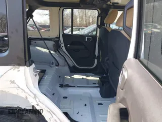 2020 Jeep Wrangler Unlimited Sahara with VIN 1C4HJXEN7LW180589, listed as a IAAI auction lot 41784143 with 58,955 mi miles. Bid and sale history available at carsss.com. Image 8.