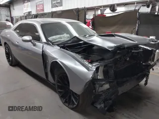 2016 Dodge Challenger R/T Plus z VIN 2C3CDZBT0GH311774, wystawiony jako IAAI lot #42313006 z przebiegiem 85 905 mil mil oraz . Historia ofert i sprzedaży dostępna na DreamBid. Obrazek 1.