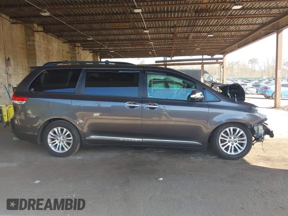 2014 Toyota Sienna XLE with VIN 5TDYK3DC5ES433949, listed as a IAAI auction lot 42095625 with 337,642 mi miles and . Bid and sale history available at DreamBid. Image 14.