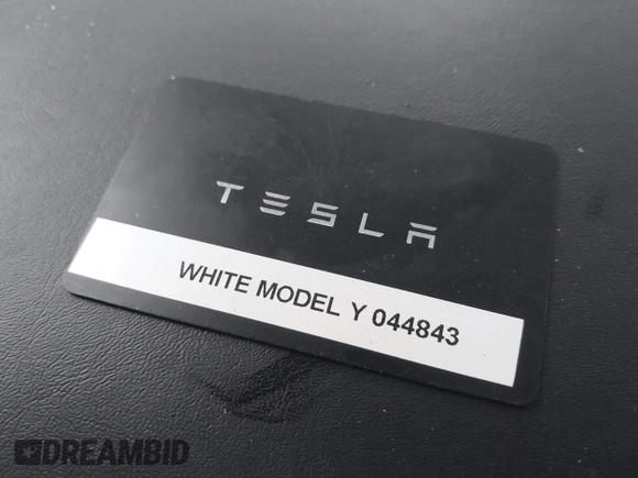 2020 Tesla Model Y Long Range with VIN 5YJYGDEE4LF044843, listed as a IAAI auction lot 41799504 with 40,770 mi miles and . Bid and sale history available at DreamBid. Image 11.