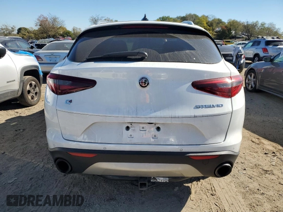 2019 Alfa Romeo Stelvio Ti Lusso z VIN ZASPAKBN2K7C49899, wystawiony jako Copart lot #77323474 z przebiegiem 88 826 mil mil oraz Szkoda całkowita • Salvage title. Historia ofert i sprzedaży dostępna na DreamBid. Obrazek 6.