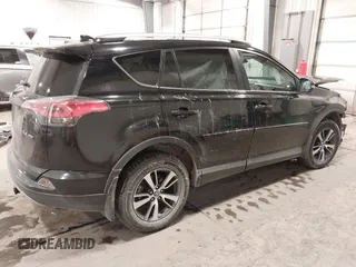 2018 Toyota RAV4 XLE with VIN 2T3RFREV3JW817989, listed as a IAAI auction lot 41636957 with 182,265 mi miles. Bid and sale history available at carsss.com. Image 4.