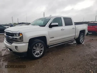 2018 Chevrolet Silverado 1500 High Country with VIN 3GCUKTEC5JG580097, listed as a Copart auction lot 50830085 with 106,185 mi miles and Salvage Title. Bid and sale history available at DreamBid. Image 1.