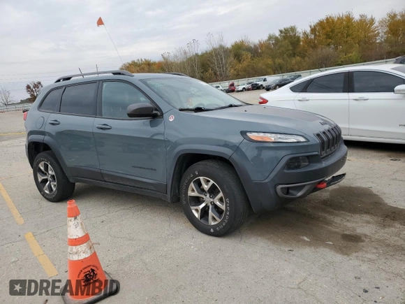 2015 Jeep Cherokee Trailhawk with VIN 1C4PJMBS0FW578199, listed as a Copart auction lot 77538544 with 122,444 mi miles and Salvage Title. Bid and sale history available at carsss.com. Image 4.