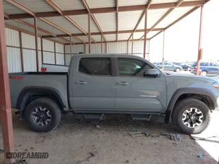 2023 Toyota Tacoma 4WD SR with VIN 3TMCZ5ANXPM613857, listed as a IAAI auction lot 41771957 with 76,232 mi miles. Bid and sale history available at carsss.com. Image 13.