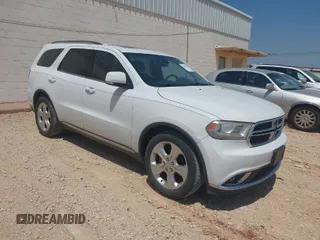 2014 Dodge Durango Limited with VIN 1C4RDHDG7EC382843, listed as a IAAI auction lot 42052688 with 142,706 mi miles. Bid and sale history available at carsss.com. Image 1.