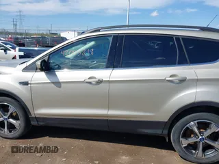 2018 Ford Escape SEL with VIN 1FMCU9HD1JUD49543, listed as a IAAI auction lot 42003218 with 122,768 mi miles. Bid and sale history available at carsss.com. Image 14.