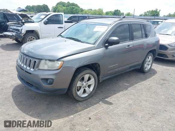 2011 Jeep Compass Latitude with VIN 1J4NT1FB4BD246549, listed as a IAAI auction lot 42156761 with 232,739 mi miles. Bid and sale history available at carsss.com. Image 2.