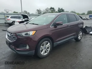 2019 Ford Edge SEL z VIN 2FMPK4J97KBB23143, wystawiony jako Copart lot #60030485 z przebiegiem 84 802 mil mil oraz Szkoda całkowita • Salvage title. Historia ofert i sprzedaży dostępna na DreamBid. Obrazek 1.