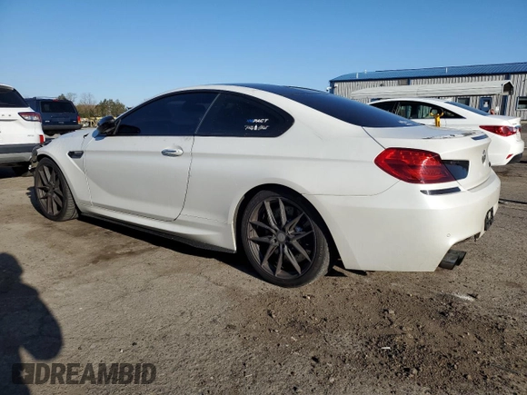2015 BMW M6 z VIN WBSLX9C51FD160757, wystawiony jako Copart lot #51991315 z przebiegiem 71 133 mil mil oraz Szkoda całkowita • Salvage title. Historia ofert i sprzedaży dostępna na DreamBid. Obrazek 2.