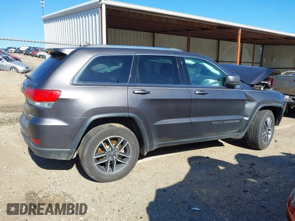 2019 Jeep Grand Cherokee Altitude with VIN 1C4RJEAG3KC534057, listed as a IAAI auction lot 41330391 with 125,175 mi miles and . Bid and sale history available at DreamBid. Image 13.