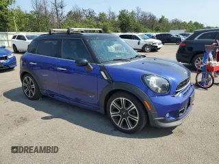 2015 MINI Countryman S with VIN WMWZC5C51FWP49167, listed as a Copart auction lot 66529445 with 109,117 mi miles and Clean title. Bid and sale history available at DreamBid. Image 4.