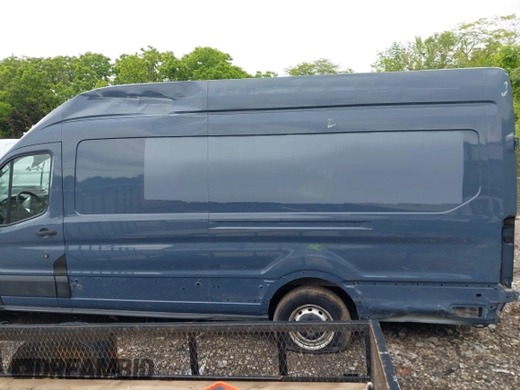 2019 Ford Transit with VIN 1FTYR3XM5KKB49658, listed as a IAAI auction lot 42262878 with 74,645 mi miles and . Bid and sale history available at DreamBid. Image 15.