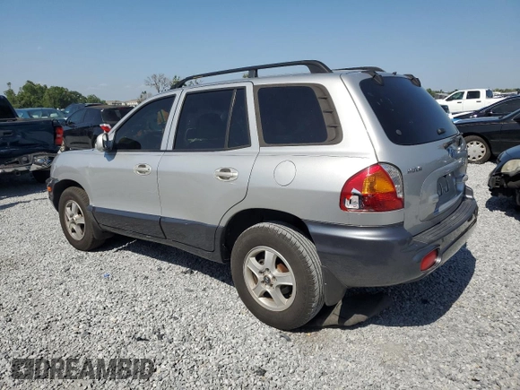 2003 Hyundai Santa Fe GLS z VIN KM8SC13D23U370587, wystawiony jako Copart lot #52775885 z przebiegiem Nie podano mil oraz Szkoda całkowita • Salvage title. Historia ofert i sprzedaży dostępna na DreamBid. Obrazek 2.