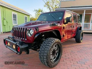 2021 Jeep Wrangler Unlimited Willys с VIN 1C4HJXDNXMW680247, выставлен на аукционе Copart как лот 59822035 с пробегом 77 407 миль миль и Чистый • Clean title. История ставок и продаж доступна на DreamBid. Изображение 2.