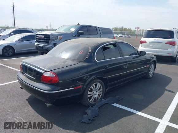 2005 Jaguar S-Type with VIN SAJWA01T45FN44765, listed as a IAAI auction lot 41916909 with Not Provided miles and . Bid and sale history available at DreamBid. Image 4.