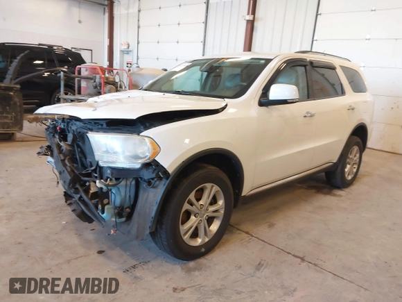 2013 Dodge Durango Crew with VIN 1C4RDHDG5DC553913, listed as a IAAI auction lot 42227189 with 209,703 mi miles and . Bid and sale history available at DreamBid. Image 17.