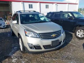 2016 Chevrolet Traverse LT z VIN 1GNKRGKD4GJ282193, wystawiony jako IAAI lot #42539750 z przebiegiem 147 160 mil mil oraz . Historia ofert i sprzedaży dostępna na DreamBid. Obrazek 1.