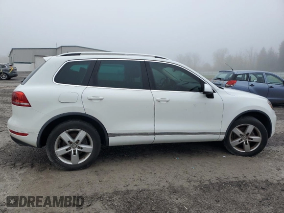 2012 Volkswagen Touareg Sport with VIN WVGEF9BP2CD010668, listed as a Copart auction lot 55306485 with 166,255 mi miles and Clean Title. Bid and sale history available at DreamBid. Image 3.
