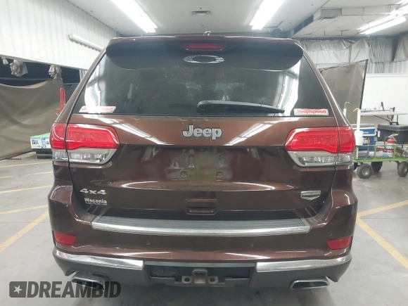 2014 Jeep Grand Cherokee Summit with VIN 1C4RJFJT6EC346575, listed as a IAAI auction lot 41881795 with 148,941 mi miles and . Bid and sale history available at DreamBid. Image 16.