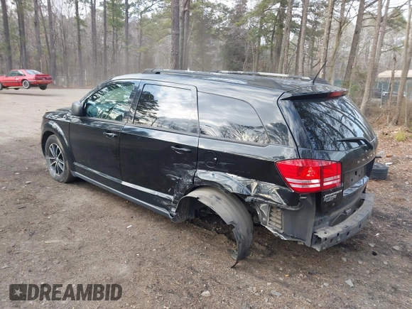 2018 Dodge Journey SE with VIN 3C4PDCAB3JT381836, listed as a IAAI auction lot 41351586 with 130,996 mi miles. Bid and sale history available at carsss.com. Image 3.