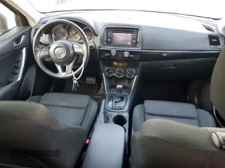 2014 Mazda CX-5 Touring with VIN JM3KE2CY8E0305641, listed as a Copart auction lot 42617165 with 107,336 mi miles and Salvage Title. Bid and sale history available at carsss.com. Image 8.
