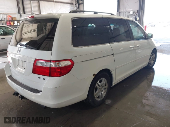 2007 Honda Odyssey EX-L with VIN 5FNRL38787B131819, listed as a IAAI auction lot 41754775 with Not Provided miles and . Bid and sale history available at DreamBid. Image 4.