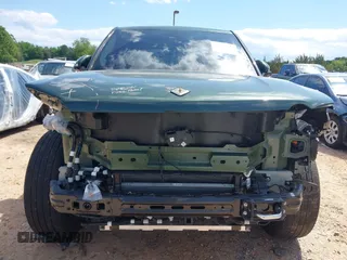 2023 Rivian R1T Adventure z VIN 7FCTGAAAXPN019894, wystawiony jako IAAI lot #42168226 z przebiegiem 23 380 mil mil oraz . Historia ofert i sprzedaży dostępna na DreamBid. Obrazek 13.