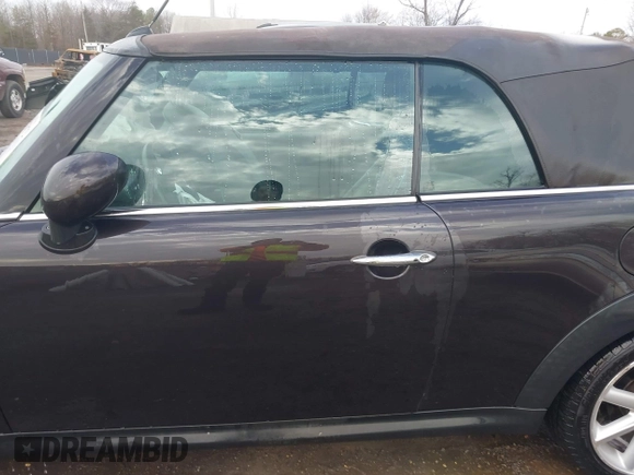 2013 MINI Convertible S with VIN WMWZP3C54DT297304, listed as a IAAI auction lot 41377572 with 101,991 mi miles and . Bid and sale history available at DreamBid. Image 14.