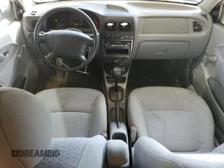 2002 Kia Rio with VIN KNADC123326133077, listed as a Copart auction lot 52427975 with 105,357 mi miles and Salvage Title. Bid and sale history available at carsss.com. Image 8.