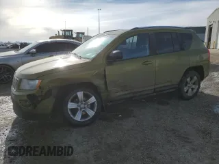 2012 Jeep Compass High Altitude with VIN 1C4NJDAB7CD554630, listed as a Copart auction lot 49915565 with 266,206 mi miles and Salvage Title. Bid and sale history available at carsss.com. Image 1.