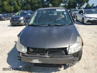 2011 Suzuki SX4 LE with VIN JS2YC5A27B6304410, listed as a Copart auction lot 72119824 with 118,357 mi miles and Salvage Title. Bid and sale history available at carsss.com. Image 5.