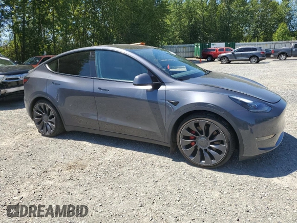 2022 Tesla Model Y Performance with VIN 7SAYGDEF3NF384161, listed as a Copart auction lot 59989145 with 12,731 mi miles and Salvage title. Bid and sale history available at DreamBid. Image 4.