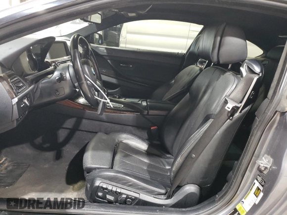 2015 BMW 6 Series 650i xDrive z VIN WBAYM1C53FD325311, wystawiony jako Copart lot #59563355 z przebiegiem 157 675 mil mil oraz Czysty tytuł • Clean title. Historia ofert i sprzedaży dostępna na DreamBid. Obrazek 7.
