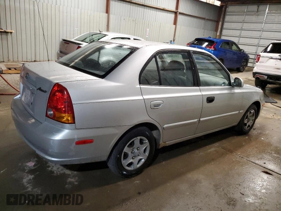 2004 Hyundai Accent GL with VIN KMHCG45C04U544804, listed as a Copart auction lot 72912984 with 121,178 mi miles and Salvage Title. Bid and sale history available at carsss.com. Image 3.