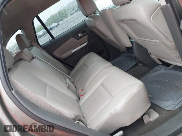 2014 Ford Edge SEL z VIN 2FMDK4JC0EBA36381, wystawiony jako IAAI lot #42236973 z przebiegiem 146 053 mil mil oraz . Historia ofert i sprzedaży dostępna na DreamBid. Obrazek 8.