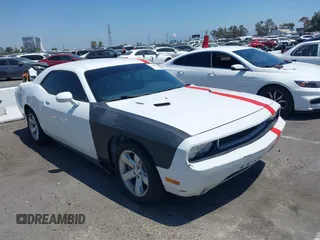 2014 Dodge Challenger R/T with VIN 2C3CDYBT1EH186372, listed as a IAAI auction lot 42654758 with 181,204 mi miles and . Bid and sale history available at DreamBid. Image 1.