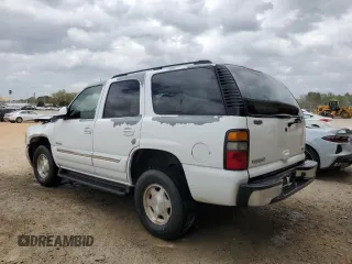 2005 GMC Yukon SLT with VIN 1GKEC13Z45J204402, listed as a Copart auction lot 51697595 with 242,881 mi miles and Salvage Title. Bid and sale history available at carsss.com. Image 2.