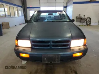 1994 Dodge Spirit Highline z VIN 1B3AA4636RF148742, wystawiony jako Copart lot #45249505 z przebiegiem 89 040 mil mil oraz Szkody całkowita. Historia ofert i sprzedaży dostępna na DreamBid. Obrazek 5.