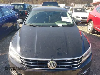 2016 Volkswagen Passat SE with VIN 1VWBT7A30GC049027, listed as a IAAI auction lot 41878460 with 125,261 mi miles and . Bid and sale history available at DreamBid. Image 12.