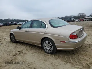 2003 Jaguar S-Type z VIN SAJEA01U33HM71782, wystawiony jako Copart lot #82969304 z przebiegiem 127 176 mil mil oraz Szkody całkowita. Historia ofert i sprzedaży dostępna na DreamBid. Obrazek 2.