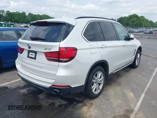 2014 BMW X5 sDrive35i z VIN 5UXKR2C54E0H34800, wystawiony jako IAAI lot #42110978 z przebiegiem 106 891 mil mil oraz . Historia ofert i sprzedaży dostępna na DreamBid. Obrazek 4.