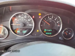 2012 Jeep Wrangler Unlimited Sahara with VIN 1C4BJWEG0CL128417, listed as a Copart auction lot 56243815 with 95,635 mi miles and Salvage title. Bid and sale history available at DreamBid. Image 9.