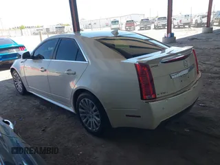 2013 Cadillac CTS Premium z VIN 1G6DS5E30D0105240, wystawiony jako IAAI lot #42145007 z przebiegiem 100 893 mil mil oraz . Historia ofert i sprzedaży dostępna na DreamBid. Obrazek 3.