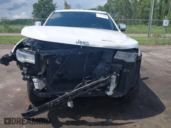 2014 Jeep Grand Cherokee Summit with VIN 1C4RJFJT6EC281114, listed as a IAAI auction lot 42497582 with 128,181 mi miles and . Bid and sale history available at DreamBid. Image 6.