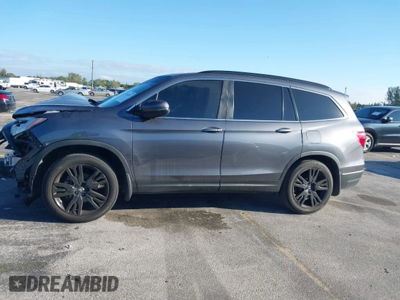 2022 Honda Pilot Special Edition with VIN 5FNYF5H25NB031399, listed as a IAAI auction lot 41638517 with 34,239 mi miles and . Bid and sale history available at carsss.com. Image 15.