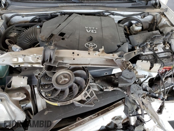 2015 Toyota Tacoma PreRunner z VIN 3TMJU4GNXFM175959, wystawiony jako Copart lot #57895825 z przebiegiem 157 955 mil mil oraz Szkoda całkowita • Salvage title. Historia ofert i sprzedaży dostępna na DreamBid. Obrazek 11.