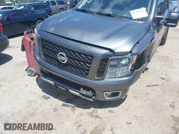 2017 Nissan Titan SV z VIN 1N6AA1E55HN551578, wystawiony jako IAAI lot #42392063 z przebiegiem 123 077 mil mil oraz . Historia ofert i sprzedaży dostępna na DreamBid. Obrazek 6.