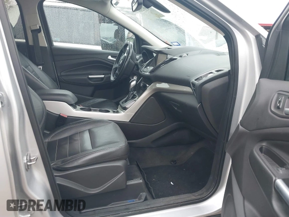 2013 Ford Escape SEL with VIN 1FMCU0H99DUC72013, listed as a IAAI auction lot 41952599 with 177,081 mi miles. Bid and sale history available at carsss.com. Image 5.